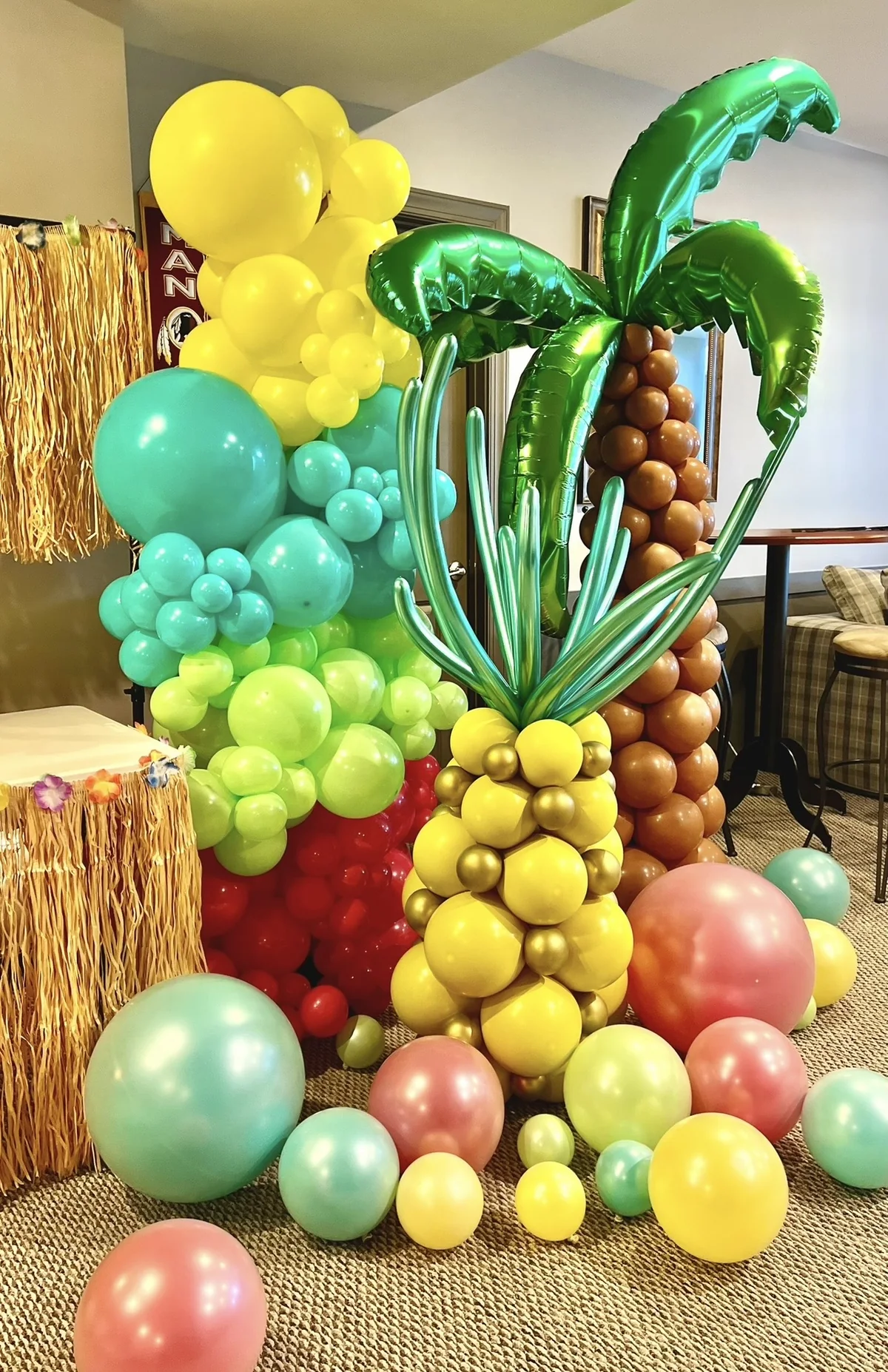 A playful sculptural balloon installation displayed outdoors